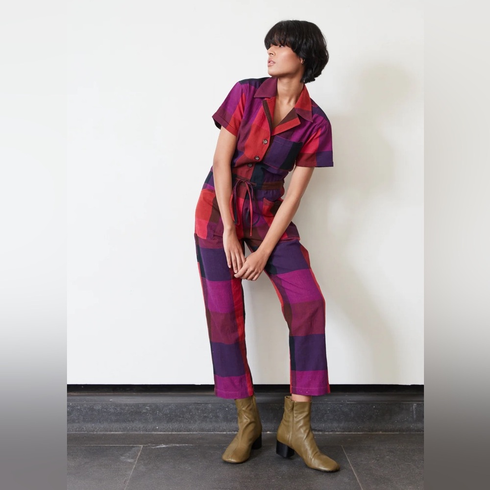 Rujuta Sheth’s pink plaid (Kinetic Chex) jumpsuit.
